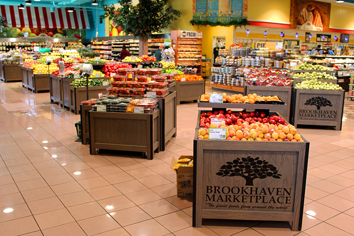 produce department with custom orchard bins